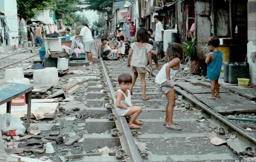 Living and playing along the rails. Children like these are the preferred demographic for recruitment by criminal syndicates