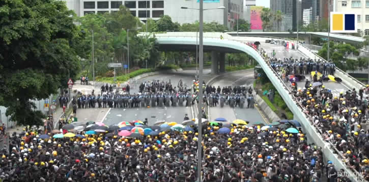 Student protesters and police face off in Hong Kong on July 1, 2019